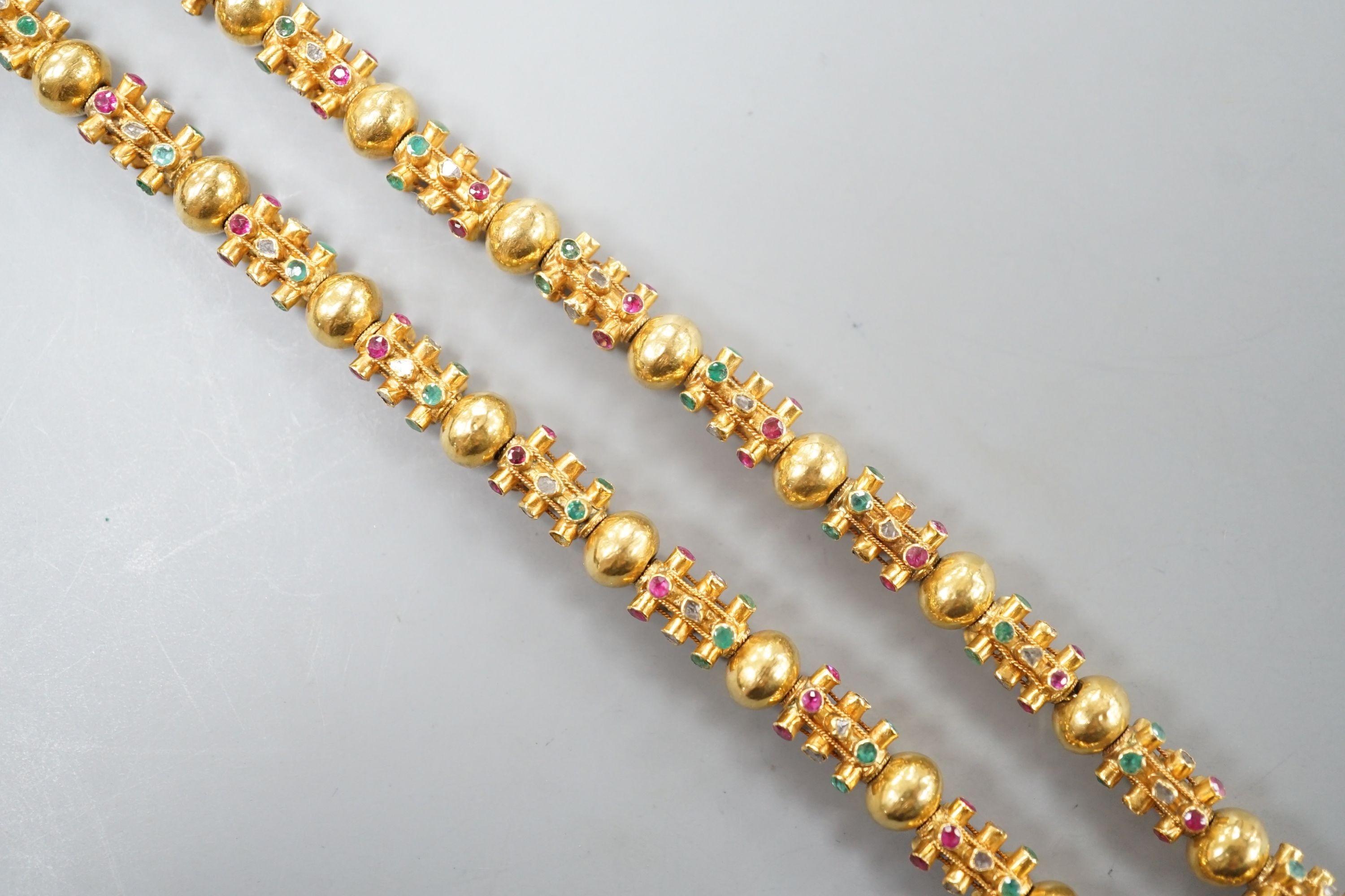 A modern Thai yellow metal and multi gem set necklace, 70cm, gross weight 55.1 grams.